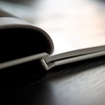 Choose photo book by price or quality?